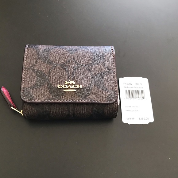 coach small trifold wallet in signature canvas